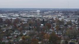 5.7K aerial stock footage of a water tower surrounded by warehouse buildings in Lexington, Kentucky Aerial Stock Footage | DX0001_003236