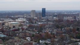 5.7K aerial stock footage of passing by skyscrapers in the city skyline, seen from neighborhoods, Downtown Lexington, Kentucky Aerial Stock Footage | DX0001_003245