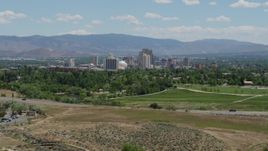 5.7K aerial stock footage of a view of the city skyline from a park in Reno, Nevada Aerial Stock Footage | DX0001_004_004