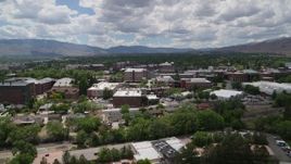 5.7K aerial stock footage a reverse view of buildings on the campus of the University of Nevada in Reno, Nevada Aerial Stock Footage | DX0001_004_017