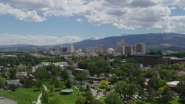 5.7K aerial stock footage of an approach to hotels and casinos of the city's skyline in Reno, Nevada Aerial Stock Footage | DX0001_004_030