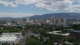 5.7K aerial stock footage of passing the hotels and casinos in the city's skyline in Reno, Nevada Aerial Stock Footage | DX0001_004_032