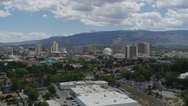 5.7K aerial stock footage of flying by the hotels and casinos in the city's skyline in Reno, Nevada Aerial Stock Footage | DX0001_004_033