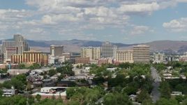 5.7K aerial stock footage of passing a group of casino resorts of Reno, Nevada Aerial Stock Footage | DX0001_004_061