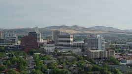 5.7K aerial stock footage of flying by a group of office buildings in Reno, Nevada Aerial Stock Footage | DX0001_006_013