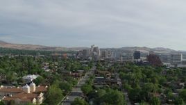 5.7K aerial stock footage of casino resorts and office buildings seen from suburban neighborhood in Reno, Nevada Aerial Stock Footage | DX0001_006_019