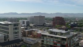 5.7K aerial stock footage of passing by the city's office buildings in Reno, Nevada Aerial Stock Footage | DX0001_006_037