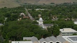 5.7K aerial stock footage of flying by the Nevada State Capitol building in Carson City, Nevada Aerial Stock Footage | DX0001_007_007