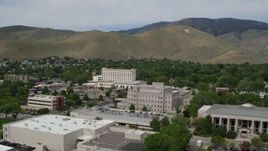 5.7K aerial stock footage flyby Supreme Court, Nevada State Legislature, and focus on office building in Carson City, Nevada Aerial Stock Footage | DX0001_007_014