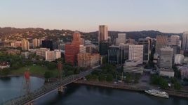 4K aerial stock footage flying away from downtown by Hawthorne Bridge, Downtown Portland, Oregon Aerial Stock Footage | DX0001_010_011