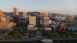 4K aerial stock footage of downtown office buildings and skyscrapers at sunrise, Downtown Portland, Oregon Aerial Stock Footage | DX0001_010_016