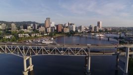 4K aerial stock footage approaching and flying over the Marquam Bridge, I-5, Downtown Portland, Oregon Aerial Stock Footage | DX0001_010_038