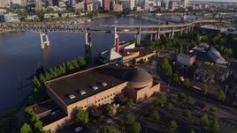 5.7K aerial stock footage flying away from OSMI, Marquam Bridge and Willamette River, Southeast Portland, Oregon Aerial Stock Footage | DX0001_010_043