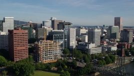 5.7K aerial stock footage of downtown buildings, descending over the Willamette River, Downtown Portland, Oregon Aerial Stock Footage | DX0001_011_008