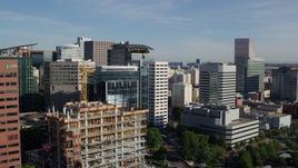 5.7K aerial stock footage flying over Willamette River, approaching downtown buildings, Downtown Portland, Oregon Aerial Stock Footage | DX0001_011_009