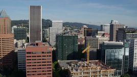 5.7K aerial stock footage flying closely by office buildings and skyscrapers, Downtown Portland, Oregon Aerial Stock Footage | DX0001_011_014