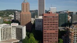 5.7K aerial stock footage flying by Umpqua Bank Plaza, downtown skyscrapers, Downtown Portland, Oregon Aerial Stock Footage | DX0001_011_017