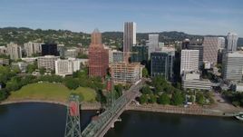 5.7K aerial stock footage of downtown office buildings, skyscrapers, and waterfront park in Downtown Portland, Oregon Aerial Stock Footage | DX0001_011_025