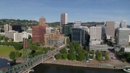 5.7K aerial stock footage approaching office buildings and KOIN Center from the river in Downtown Portland, Oregon Aerial Stock Footage | DX0001_011_026