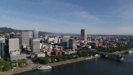 5.7K aerial stock footage of downtown office buildings along the river, Downtown Portland, Oregon Aerial Stock Footage | DX0001_011_030