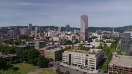 5.7K aerial stock footage side view of office buildings and White Stag sign, Downtown Portland, Oregon Aerial Stock Footage | DX0001_012_002