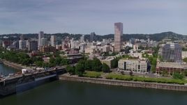 5.7K aerial stock footage of Burnside Bridge and the iconic White Stag building and sign, Downtown Portland, Oregon Aerial Stock Footage | DX0001_012_004