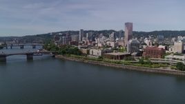5.7K aerial stock footage descending to stationary over Willamette River, looking toward Downtown  Portland, Oregon Aerial Stock Footage | DX0001_012_010