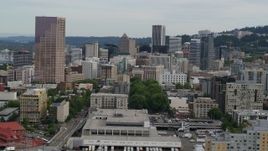 5.7K aerial stock footage of US Bankcorp Tower seen from the Peal District, sunset, Downtown Portland, Oregon Aerial Stock Footage | DX0001_013_015