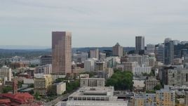 5.7K aerial stock footage of US Bankcorp Tower and office buildings at sunset, Downtown Portland, Oregon Aerial Stock Footage | DX0001_013_018