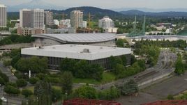 5.7K aerial stock footage of Moda Center and Veterans Memorial Coliseum, sunset, Northeast Portland, Oregon Aerial Stock Footage | DX0001_013_020