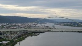 5.7K aerial stock footage of Fremont Bridge with traffic crossing the span, sunset, Downtown Portland, Oregon Aerial Stock Footage | DX0001_013_021