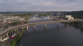 5.7K aerial stock footage approaching Marquam bridge with light traffic, sunset, South Portland, Oregon Aerial Stock Footage | DX0001_014_008
