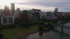 5.7K aerial stock footage approaching Downtown Portland, Oregon from the river, sunset Aerial Stock Footage | DX0001_014_009