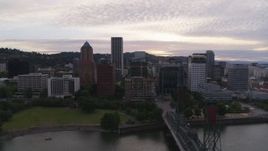 5.7K aerial stock footage of a wide view of the Downtown Portland skyline at sunset, Oregon Aerial Stock Footage | DX0001_014_013