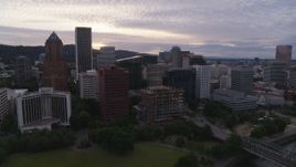 5.7K aerial stock footage flying away from Downtown Portland office buildings and hotel at twilight, Oregon Aerial Stock Footage | DX0001_014_018