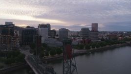5.7K aerial stock footage of riverfront office buildings and seen from Hawthorne Bridge, twilight, Downtown Portland, Oregon Aerial Stock Footage | DX0001_014_024