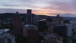 5.7K aerial stock footage orbiting tall skyscrapers in Downtown Portland, Oregon at twilight Aerial Stock Footage | DX0001_014_035