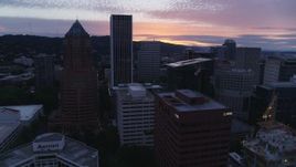 5.7K aerial stock footage of a reverse view of Downtown Portland, Oregon skyscrapers at twilight Aerial Stock Footage | DX0001_014_039