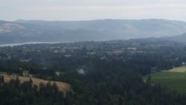 5.7K aerial stock footage of a small town by a river in Hood River, Oregon Aerial Stock Footage | DX0001_015_035