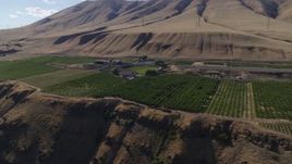 5.7K aerial stock footage of the cliffside Maryhill Winery and vineyards in Goldendale, Washington Aerial Stock Footage | DX0001_018_014
