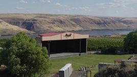 5.7K aerial stock footage flying over stage at the Maryhill Winery to approach Columbia River in Goldendale, Washington Aerial Stock Footage | DX0001_018_021