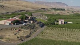 5.7K aerial stock footage of flying by the Maryhill Winery and amphitheater in Goldendale, Washington Aerial Stock Footage | DX0001_018_039