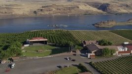 5.7K aerial stock footage of the Maryhill Winery amphitheater stage, main building, Columbia River in Goldendale, Washington Aerial Stock Footage | DX0001_019_011