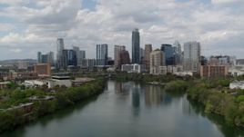 5.7K aerial stock footage of a view of the city skyline from Lady Bird Lake, Downtown Austin, Texas Aerial Stock Footage | DX0002_102_015