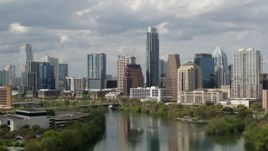 5.7K aerial stock footage a view of skyscrapers in Downtown Austin, Texas from Lady Bird Lake Aerial Stock Footage | DX0002_103_003