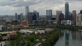 5.7K aerial stock footage a view of waterfront skyscrapers by Lady Bird Lake in Downtown Austin, Texas Aerial Stock Footage | DX0002_103_016