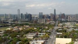 5.7K aerial stock footage of flying near Congress Avenue with view of the city's skyline in Downtown Austin, Texas Aerial Stock Footage | DX0002_103_022