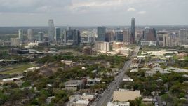 5.7K aerial stock footage slow pass by Congress Avenue leading to city's skyline in Downtown Austin, Texas Aerial Stock Footage | DX0002_103_025