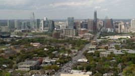 5.7K aerial stock footage slow descent by Congress Avenue leading to city's skyline in Downtown Austin, Texas Aerial Stock Footage | DX0002_103_027