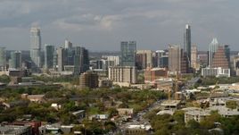 5.7K aerial stock footage ascend for a view of the city's skyline in Downtown Austin, Texas Aerial Stock Footage | DX0002_103_028